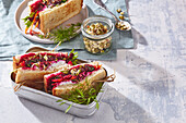 Beet sandwich with hummus and sprouts