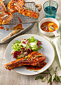 Grilled pork chops with maple syrup glaze and fruit chutney