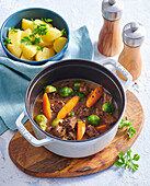Rich beef stew with kale