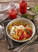 Spaghetti with homemade ketchup and parmesan