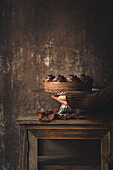 Vegan chocolate cake against a brown background