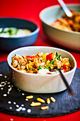 Ground turkey, peppers and pine nuts with yogurt dressing