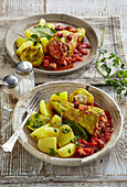Stuffed peppers with potatoes and tomato sauce