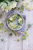 Wreath with elderflowers as table decoration