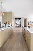 Elegant, beige kitchen with kitchen island