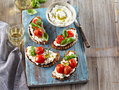Toasted bread with ricotta and grilled tomatoes