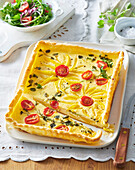 Vegetable quiche with yellow peppers and cherry tomatoes