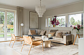 Seating area in light living room in beige tones