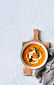 Creamy soup of Puy lentils, roasted carrots, and feta cheese