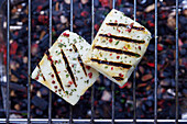 Grilled halloumi on a grill grate
