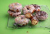 Vegan donuts with sugar icing and sprinkles