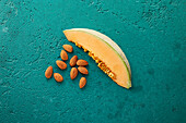 Almonds and a melon wedge