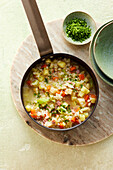 Barley soup with vegetables and ham