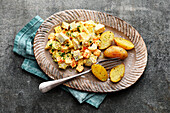 Fruity soused herring salad with papaya, pineapple and chilli