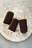 Sugar-free vanilla chocolate ices on sticks