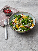 Kale and orange bowl with couscous