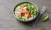 Pointed cabbage risotto with salmon
