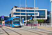 View of tram in front of Repertory Theatre, Centenary Square, Birmingham, West Midlands, England, United Kingdom, Europe