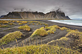 The black sand dunes and cliffs of Vestrahorn seen from Stokksnes, near Hofn, southeast Iceland, Polar Regions