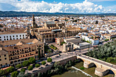 Aerial of the Historic Roman Bridge and Mezquita, UNESCO World Heritage Site, Cordoba, Andalusia, Spain, Europe