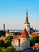 View over the Old Town towards St. Olaf's Church at sunset, UNESCO World Heritage Site, Tallinn, Estonia, Europe