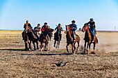 Men practising Kokpar, national horse game, Kazakhstan, Central Asia, Asia