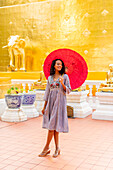 Woman at Wat Phra Singh Woramahawihan, Chiang Mai, Thailand, Southeast Asia, Asia