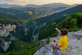 Hiker on Belvedere Alto, Furlo Gorge, Marche, Italy, Europe
