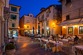 View of restaurants at dusk, Lovran, Kvarner Bay, Eastern Istria, Croatia, Europe