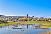 St. Andrew's Church, Alfriston, seen across the River Cuckmere, East Sussex, England, United Kingdom, Europe