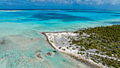 Aerial of a white coral beach, Anaa atoll, Tuamotu archipelago, French Polynesia, South Pacific, Pacific
