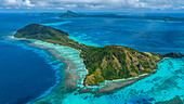 Aerial over Aukena island, Gambier archipelago, French Polynesia, South Pacific, Pacific