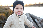 Smiling boy at lake