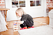 Boy playing with toy blocks