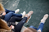 Girls sitting at water