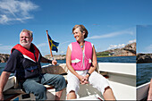 Mature couple on boat