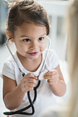 Small girl with stethoscope