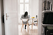 Woman sitting on chair