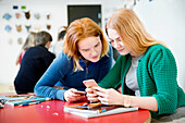 Teenage girls using Smartphone