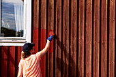 Painting wooden wall