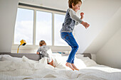Boys playing in room