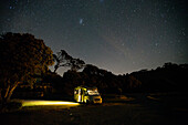 Illuminated caravan at night