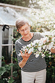 Senior woman in garden