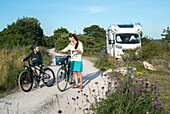 Mother and son cycling