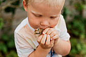 Boy kissing chick