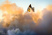 Firefighter fighting fire