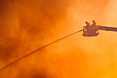 Firefighters fighting fire
