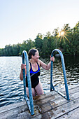 Women on swim ladder