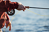 Close-up of man fishing