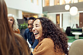 Laughing woman at meeting